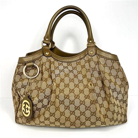 cheap stuff at gucci|authentic gucci handbags for less.